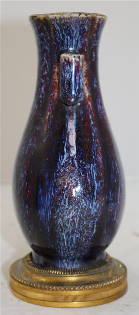 A Chinese flambe-glazed arrow vase, 18th/19th century, total height 21.7cm